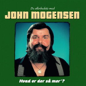 På Loftet Sidder Nissen Med Sin Julegrød